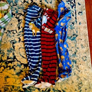 3 pairs of 4t footed pajamas. GUC